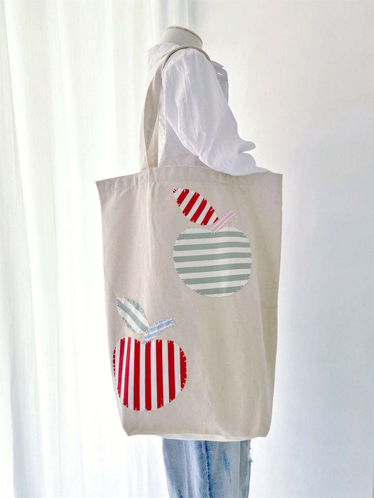 Large organic cotton tote for everyday use, a thoughtful gift for minimalists and sustainability advocates.