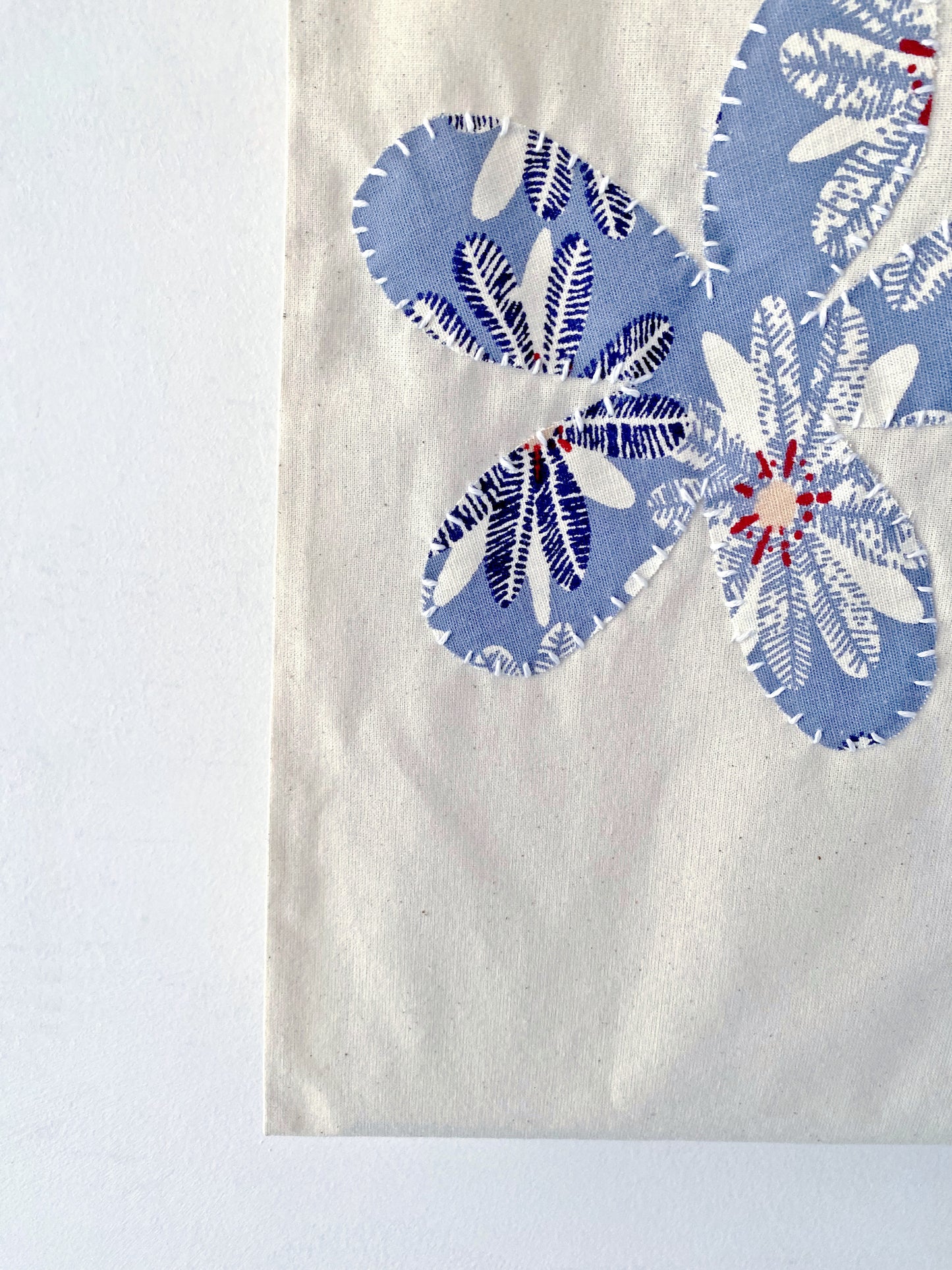 Patchwork detail cotton tote bag, often gifted to someone starting a slower, more mindful lifestyle with reusable essentials