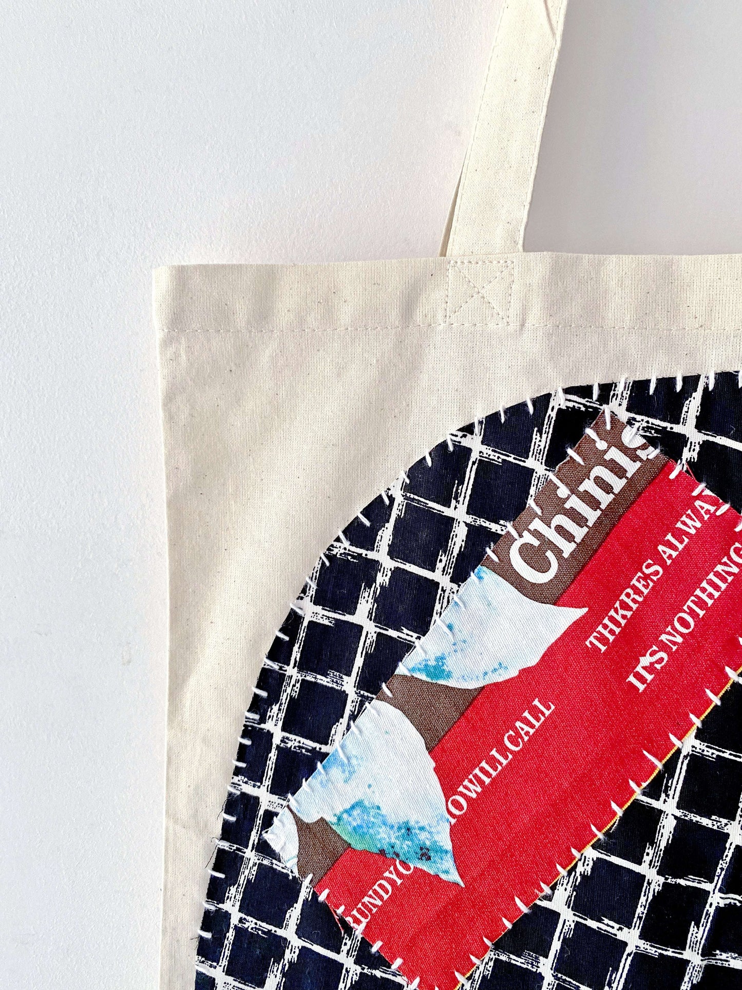 Looking for a meaningful graduation gift? This soft-structured patchwork bag celebrates individuality and sustainable future choices.
