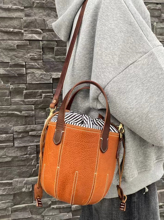 Elegant Leather Bucket Bag with Drawstring Closure