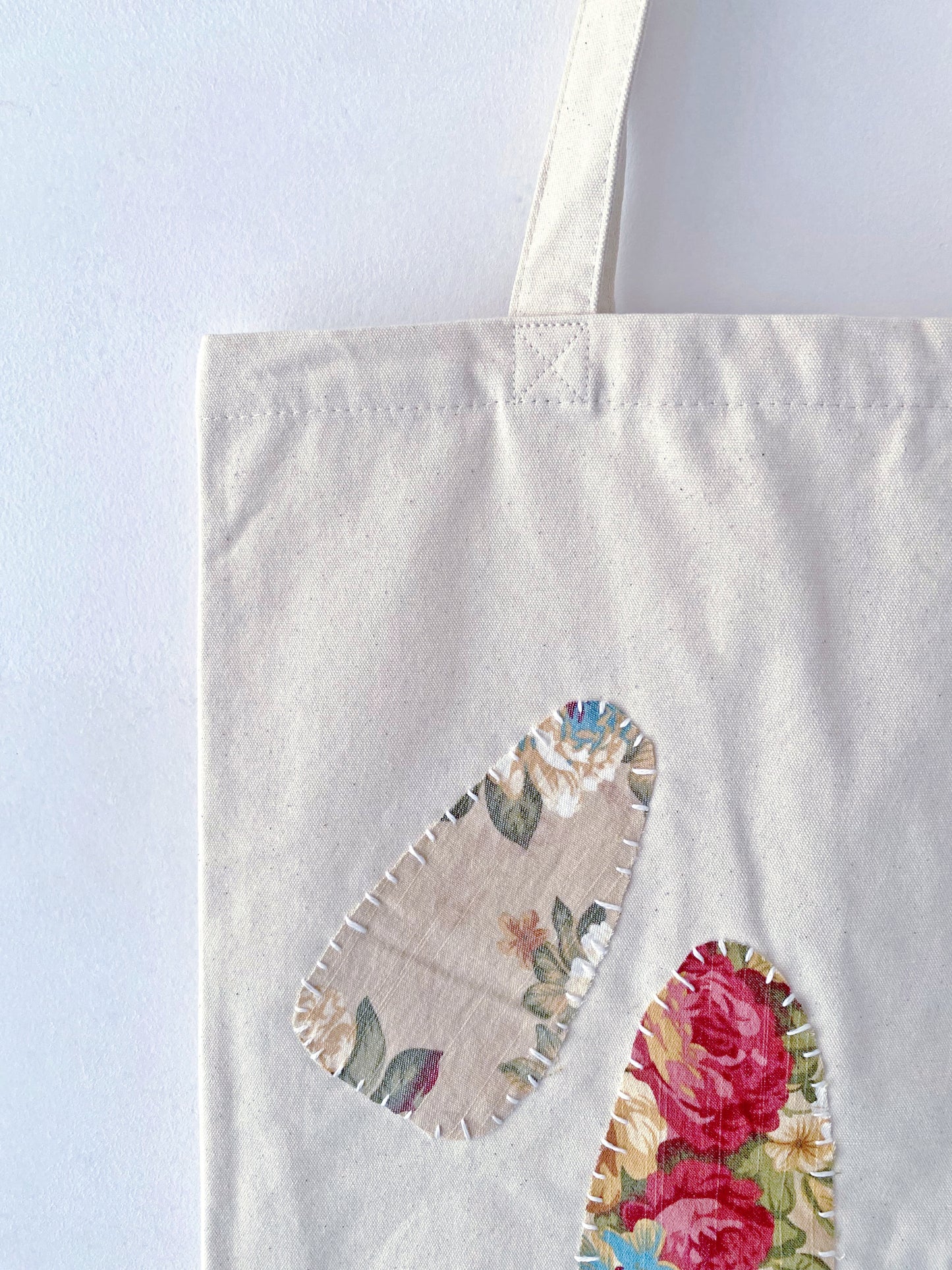 A perfect gift for those who love eco-friendly fashion, this large canvas tote offers practicality without compromising on sustainability—ideal for everyday adventures.