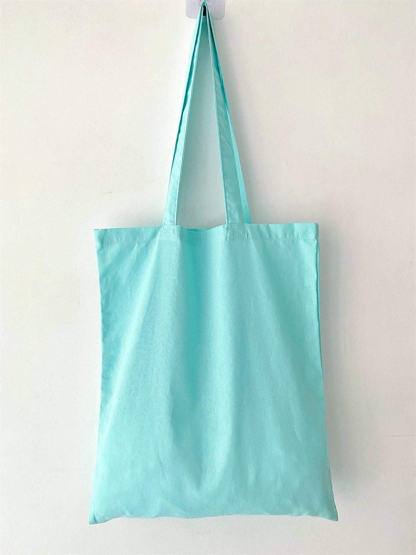 Washable natural fabric tote that gets softer with every wash, becoming a reliable staple in a minimalist wardrobe.