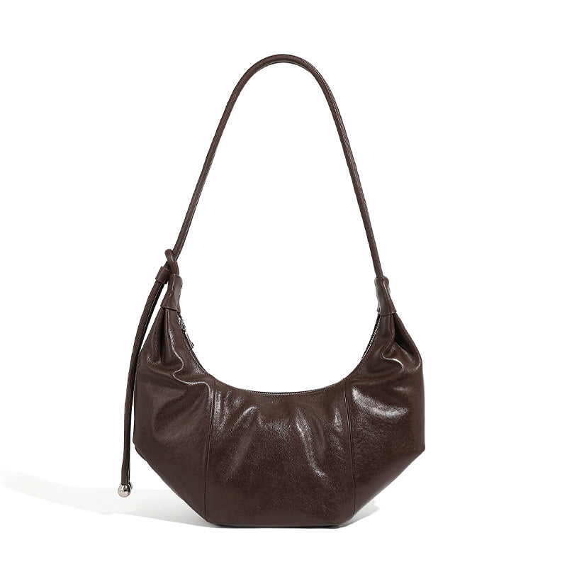 modern feminine curved handbag