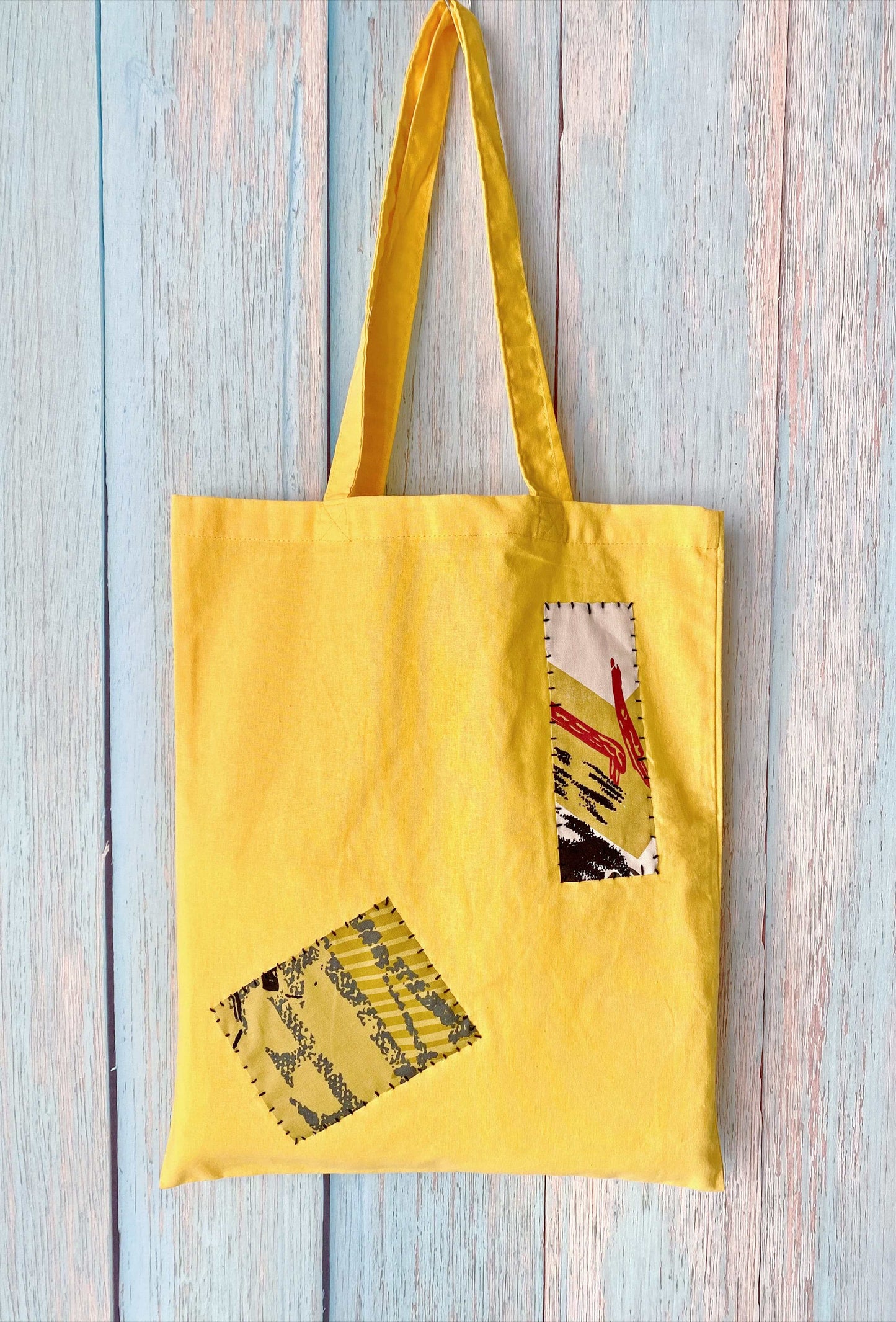 Creative patchwork design tote, unique graduation gift for students.