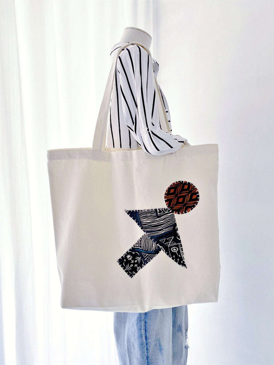 Gift-ready patchwork tote with unique hand-stitched details that make the recipient feel special, unlike standardized factory-made accessories.