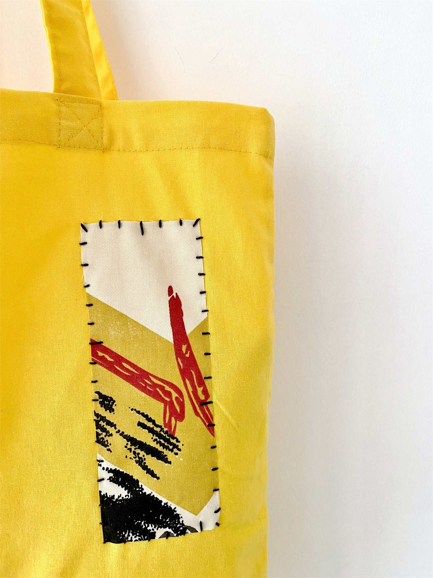 Reliable oversized cotton carrier that becomes softer with use acting as a trusty daily companion