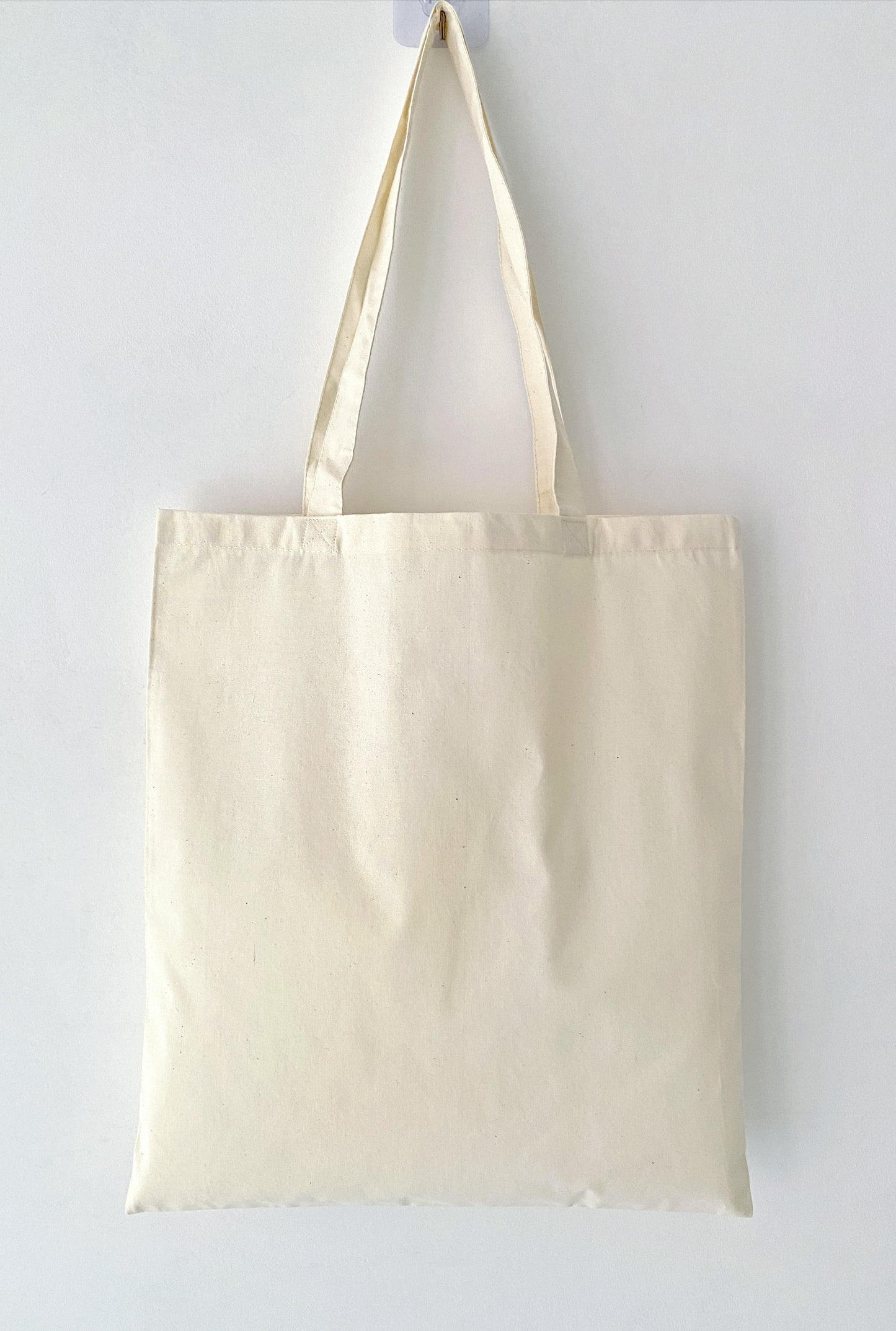 Cream aesthetic tote featuring script text styling for a casual art gallery visit.