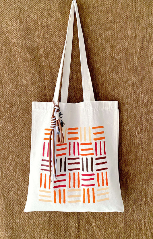 large canvas shoulder bag holding everyday essentials without structure