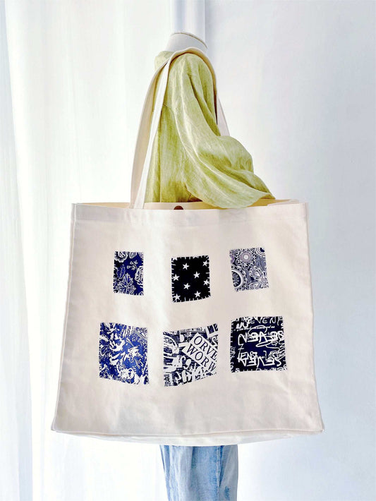 Eco-conscious shoppers will love this spacious canvas tote, with vibrant hand-stitched patchwork that adds a personal touch to every outfit.