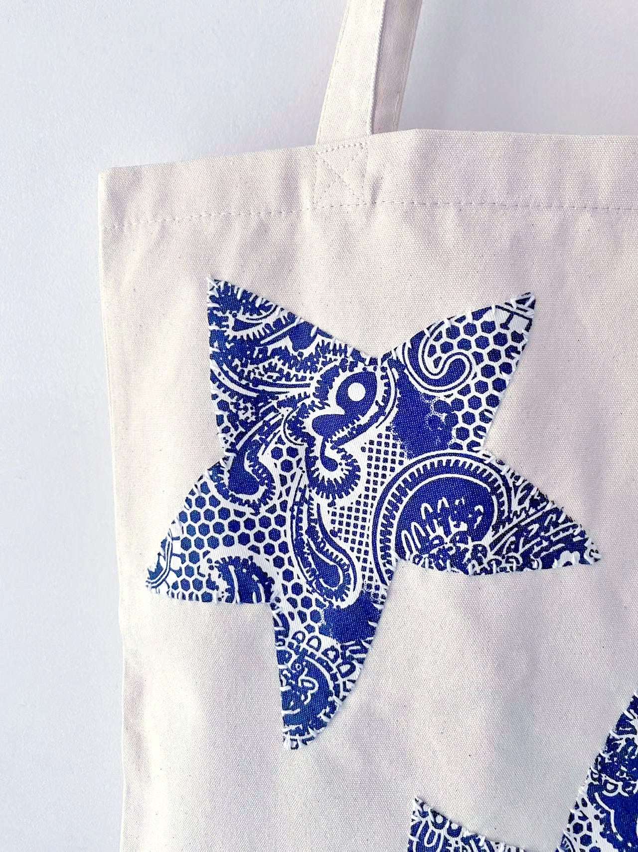 Eco-conscious gift idea: this handmade patchwork canvas tote, perfect for a friend who appreciates slow fashion and sustainable living.