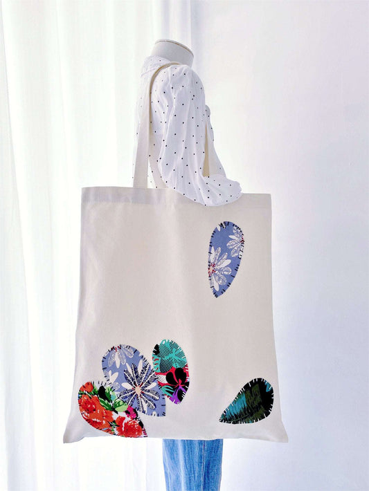 Gift a spacious, durable tote that reflects the values of sustainability and style—this canvas bag is perfect for those who value conscious choices.