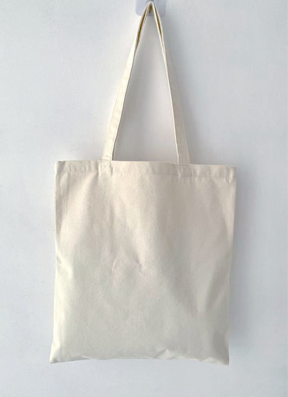 Thoughtfully designed hand-stitched patchwork tote bag, perfect for gifting to anyone who enjoys unique, handmade pieces that support sustainability.