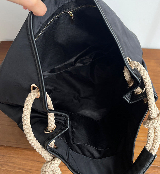 Black tote for commuting with room for essentials