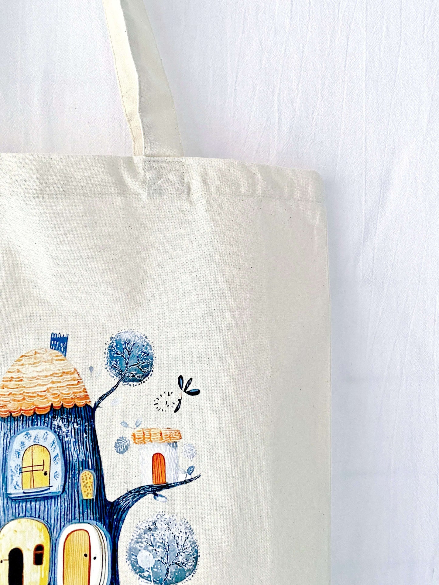 Gift a tote bag that tells a story with its hand-printed Dream Treehouse design—a perfect combination of function and style.