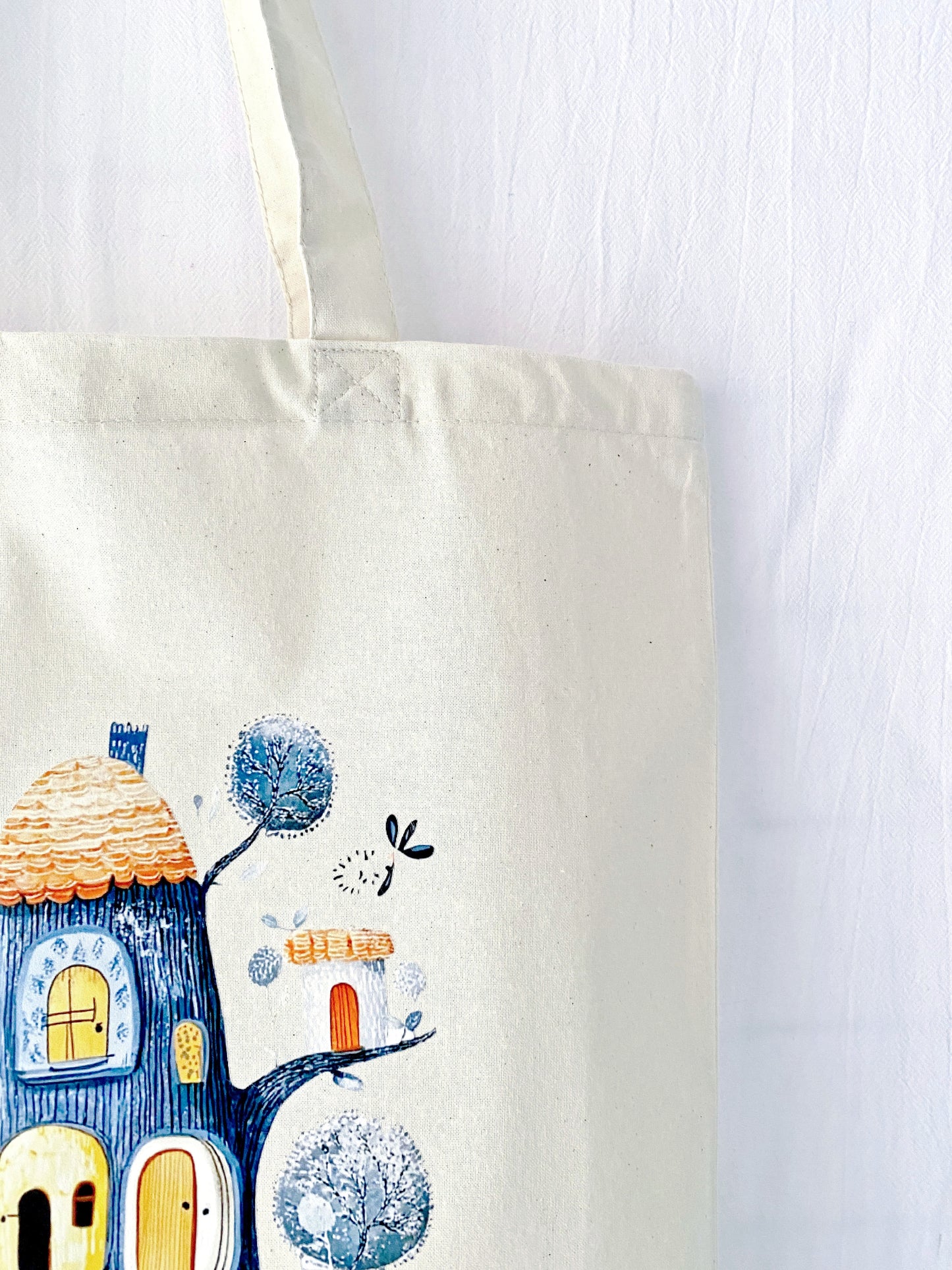 Gift a tote bag that tells a story with its hand-printed Dream Treehouse design—a perfect combination of function and style.