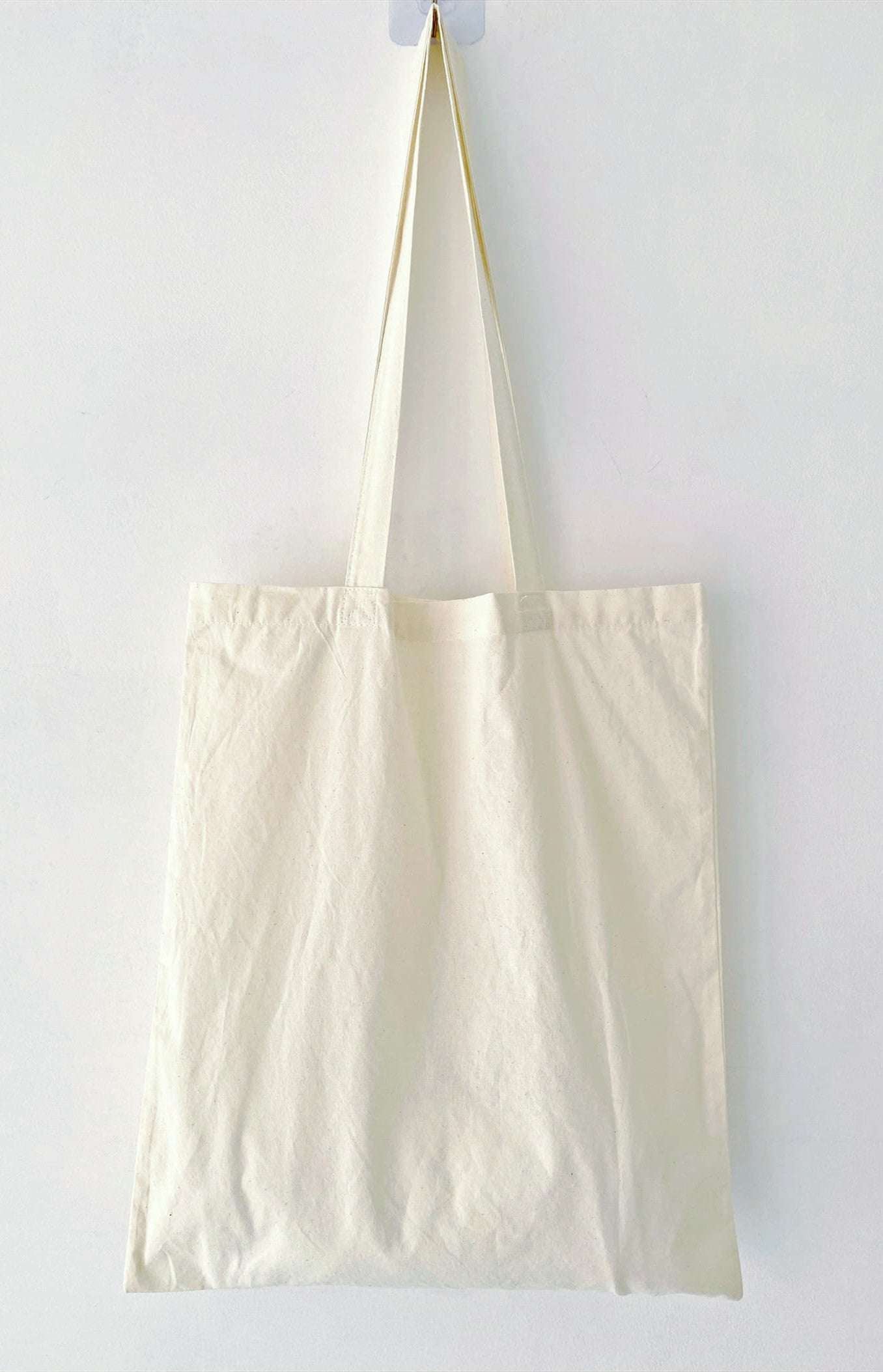 Thoughtful teacher appreciation gift: Spacious artisan-style tote, fits grading papers while showing a love for handmade art.