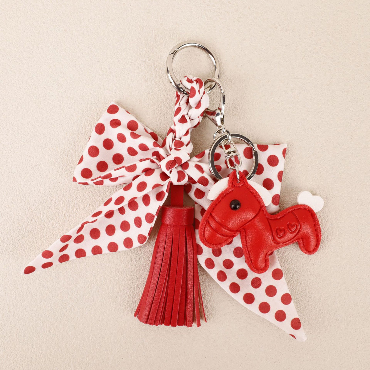 Handmade red bow pendant for customizing a handbag