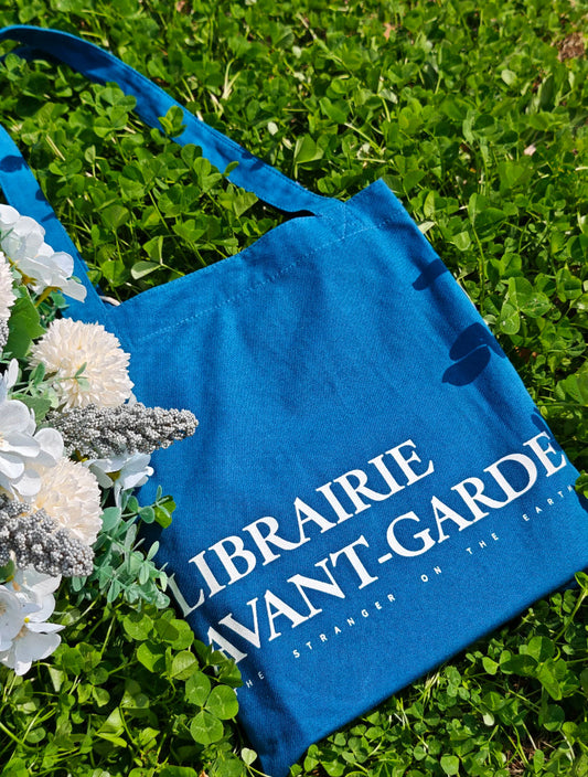 Handmade canvas tote bag with minimalist design, perfect for Parisian style.