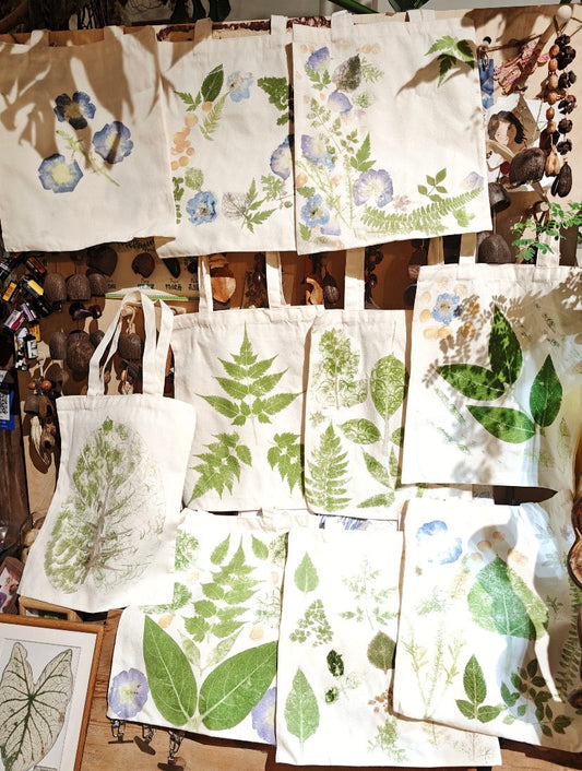 hand-painted canvas tote bag close-up highlighting imperfect brush strokes