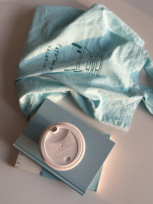 close-up of cotton tote bag material highlighting natural folds and fabric details