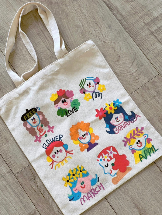 Hand-printed canvas bag with a handwritten English phrase, perfect for creative women.