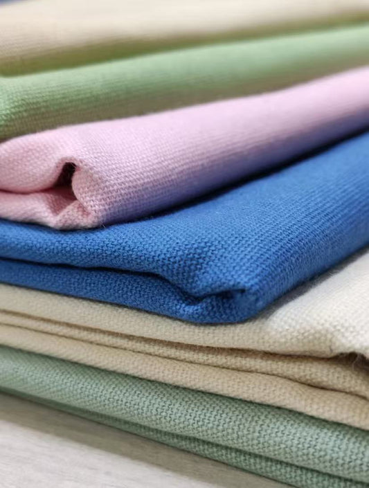 Eco-friendly tote bag filled with groceries and personal items, ideal for city travel