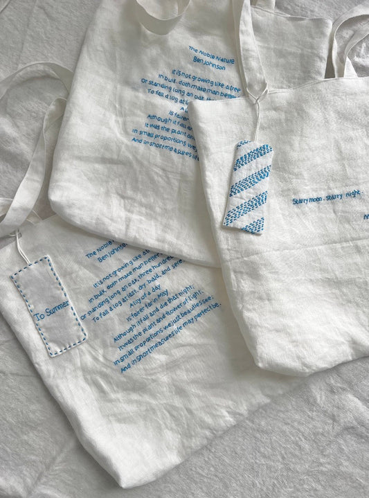 close view of sustainable tote bag fabric and stitching texture