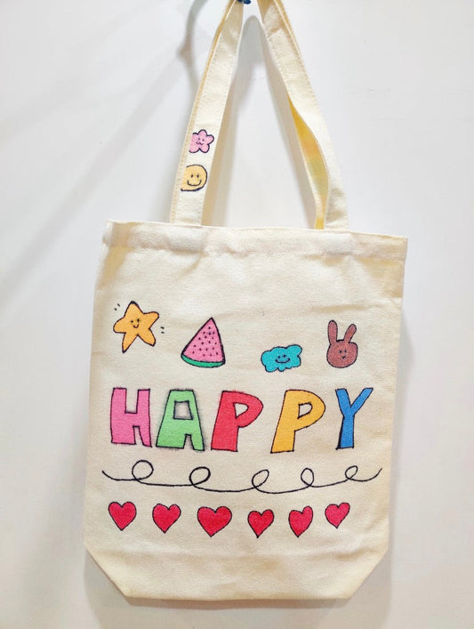 Fabric tote bag with patchwork and hand-lettered details used in everyday life