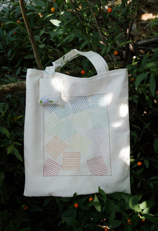 canvas tote bag with small handmade design detail