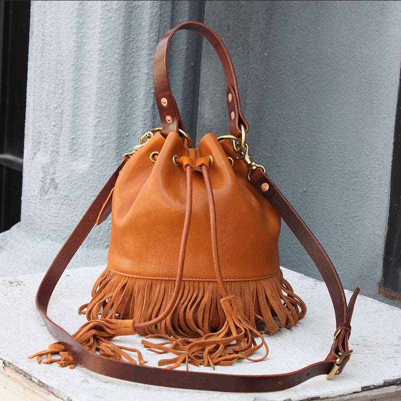Classic Handcrafted Leather Shoulder Bag with Tassel Accent Woyaza