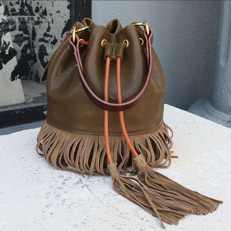 Handcrafted Leather Crossbody Bag with Tassel Detail Woyaza