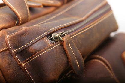 Vintage Leather Rucksack with Laptop Sleeve and Multiple Pockets woyaza