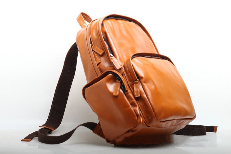 High-Capacity Genuine Leather Backpack for Business and Travel woyaza