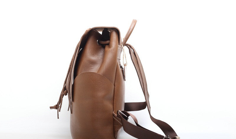 Trendy Unisex Leather Bag with Tassel Detail woyaza