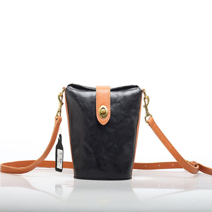 Timeless Leather Bucket Bag with Colorful Accents woyaza