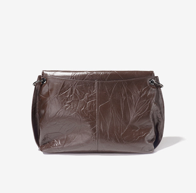 Sleek Leather Tote Bag with Chain Detail Woyaza