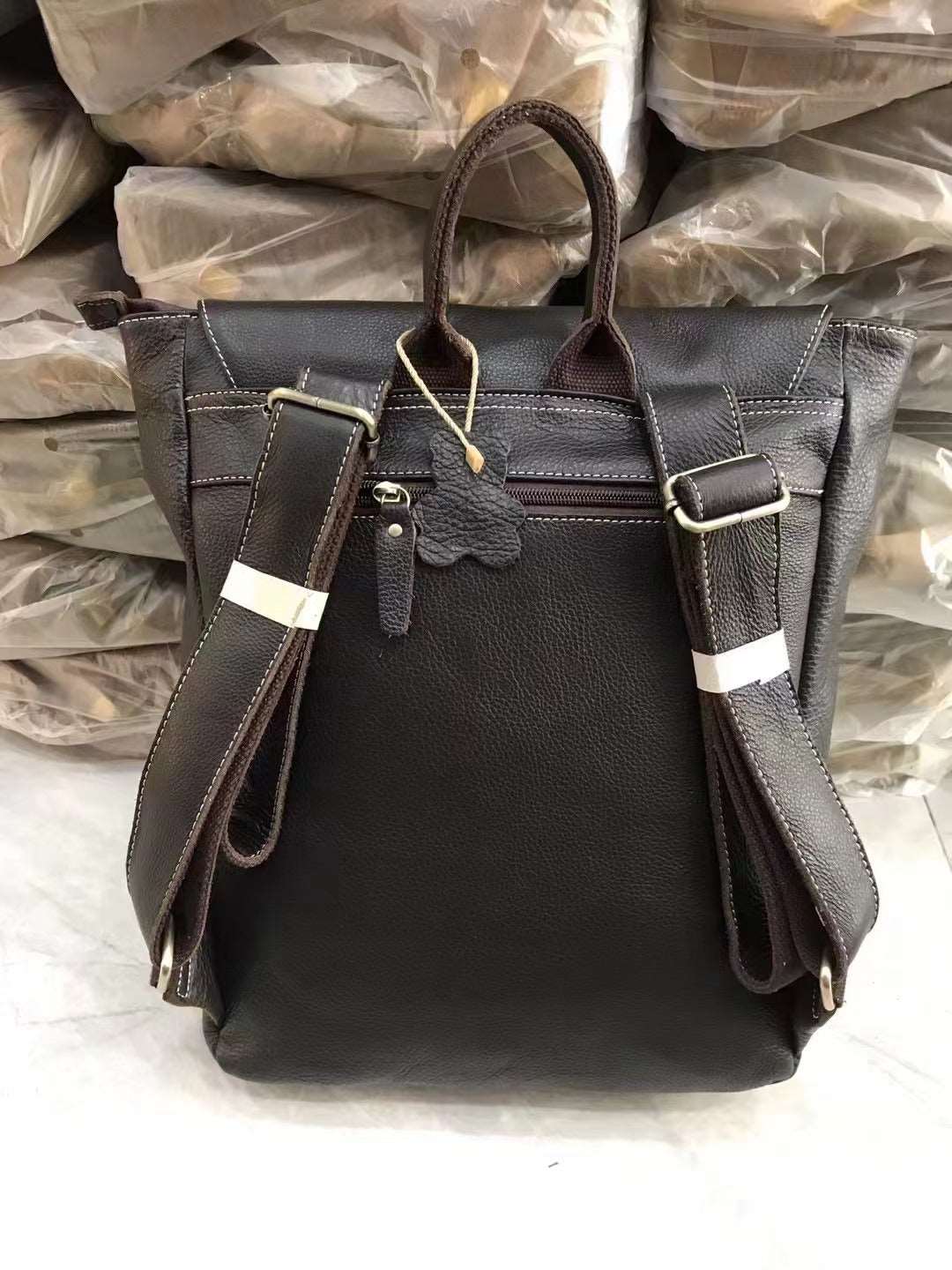 Vintage Leather Backpack with Roomy Compartments for Men woyaza
