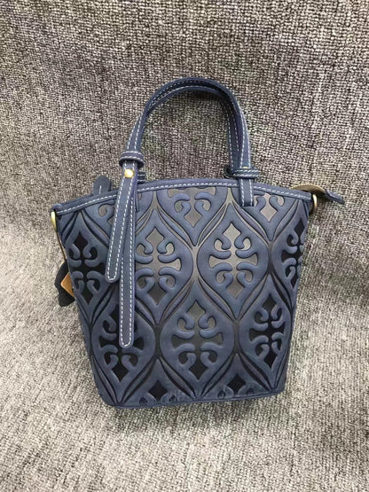 Sleek Retro Leather Crossbody Bag Embossed with Floral Motif woyaza