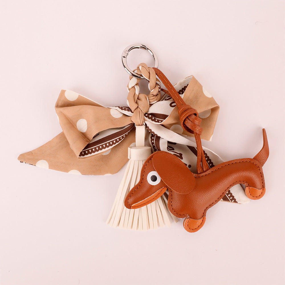 Scarf bow key holder with a delicate tassel finish
