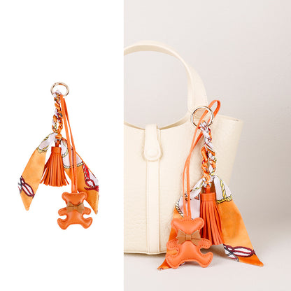 Aesthetic bear purse hanger with tassel for handbag personalization ideas