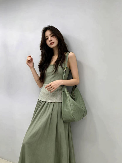 Crossbody hobo bag paired with a jacket for exploring a new city