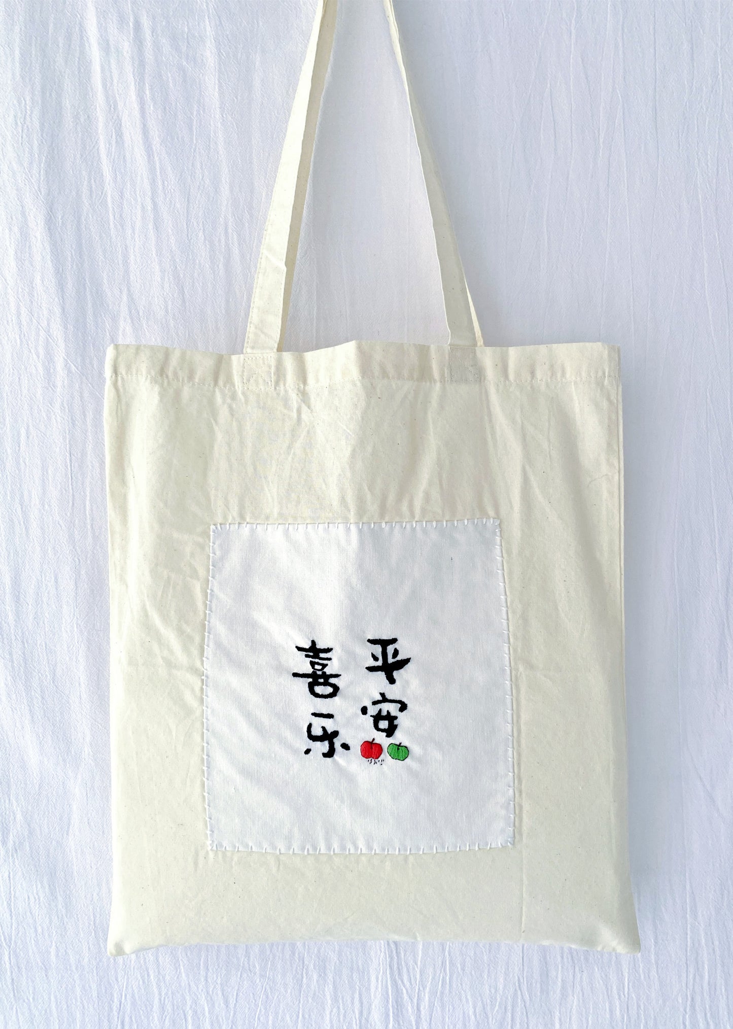 cotton tote bag with embroidered Chinese lettering design