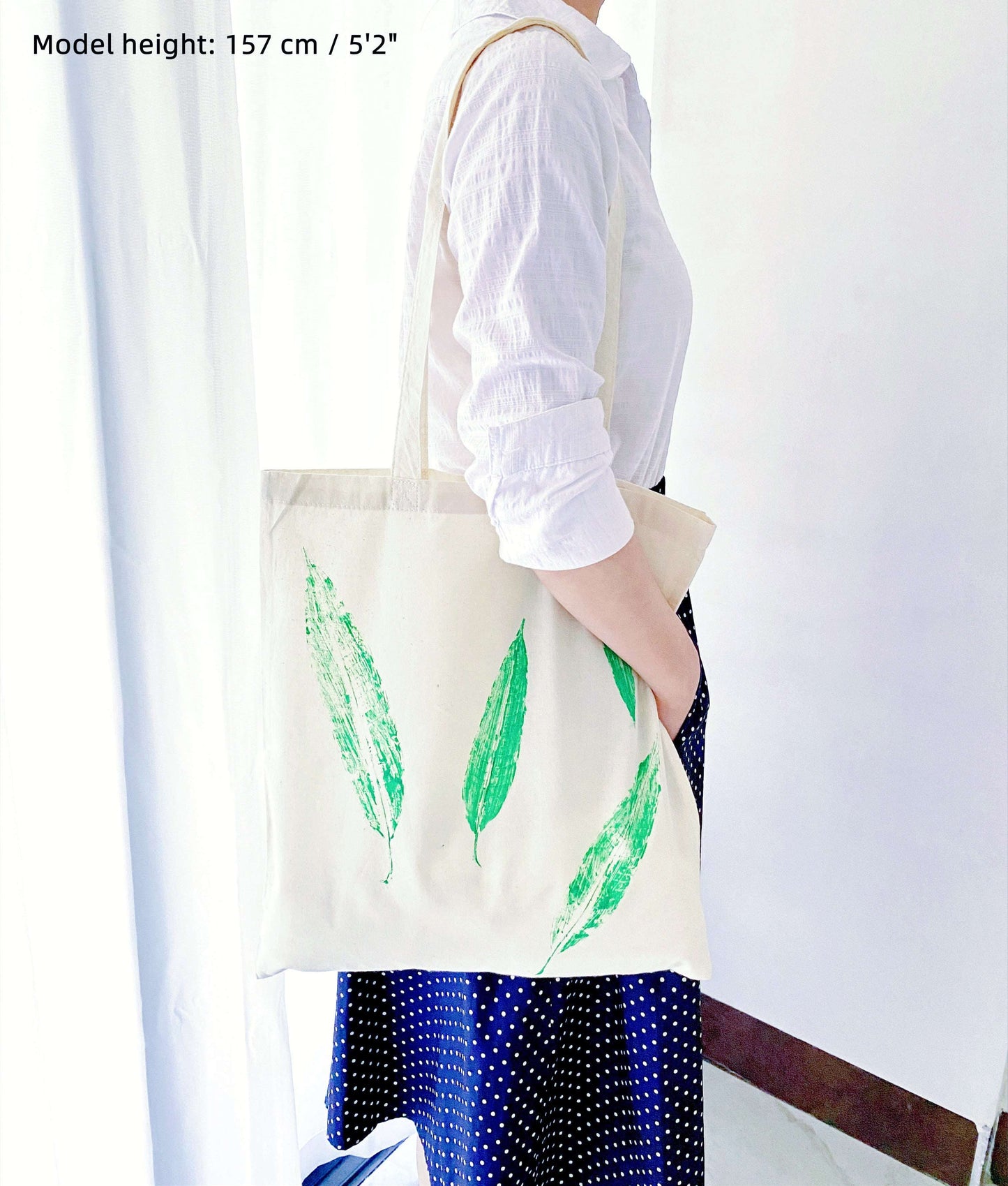 This hand-dyed leaf print cotton tote makes a thoughtful gift for nature lovers, combining beauty with eco-friendly materials.