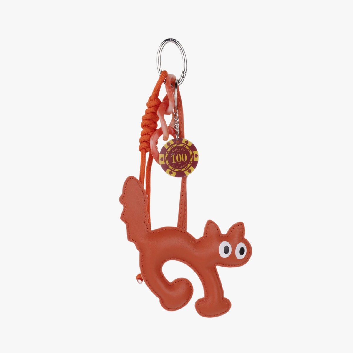 Funny cat bag charm with a hand-woven cord attached to a canvas tote handle