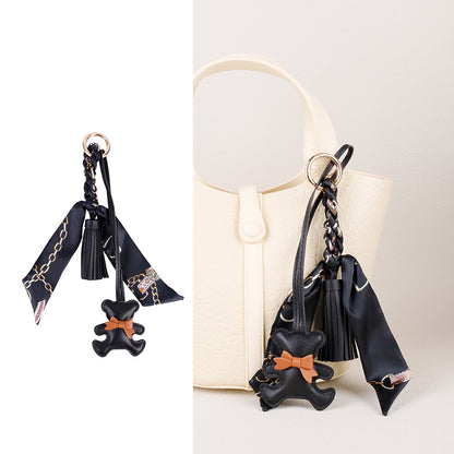 Premium handcrafted bear bag pendant adding a charm detail to luxury purses