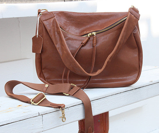 Elegant Women's Vintage Leather Handbag with Crossbody Strap, Large Capacity, and Unique Zipper Design
