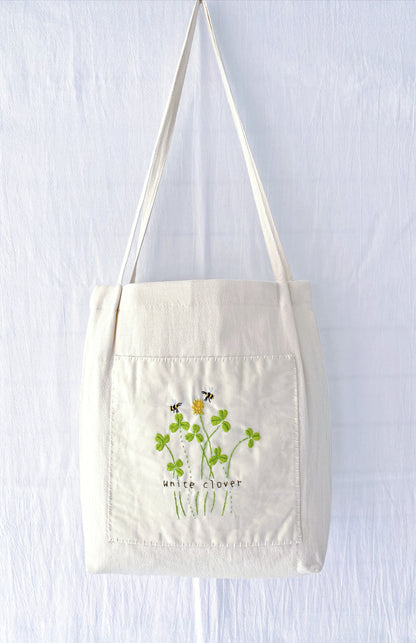 Hand-embroidered floral tote bag in eco-friendly cotton-linen – a perfect gift for nature lovers.