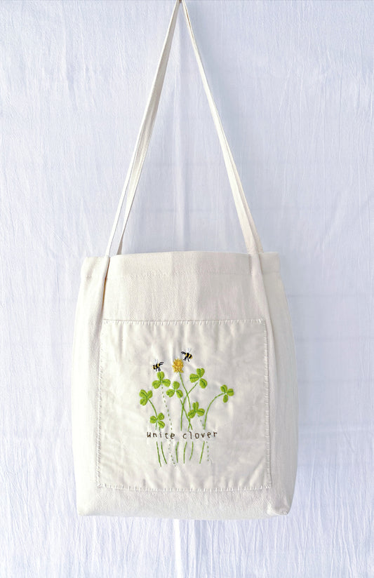 Hand-embroidered floral tote bag in eco-friendly cotton-linen – a perfect gift for nature lovers.