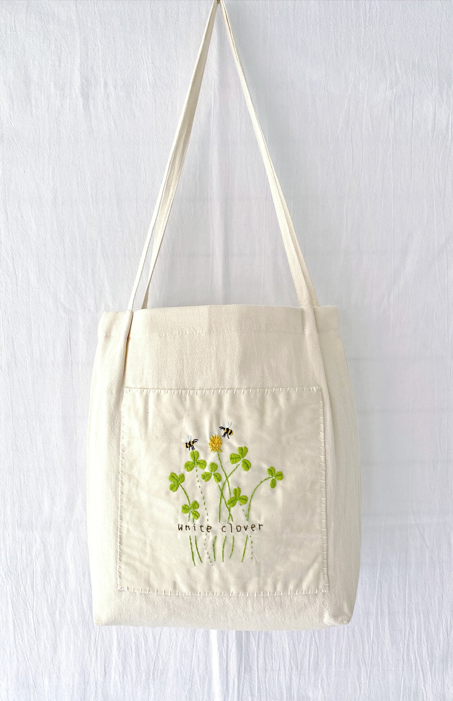 Sustainable cotton linen tote with floral embroidery, perfect for gifting