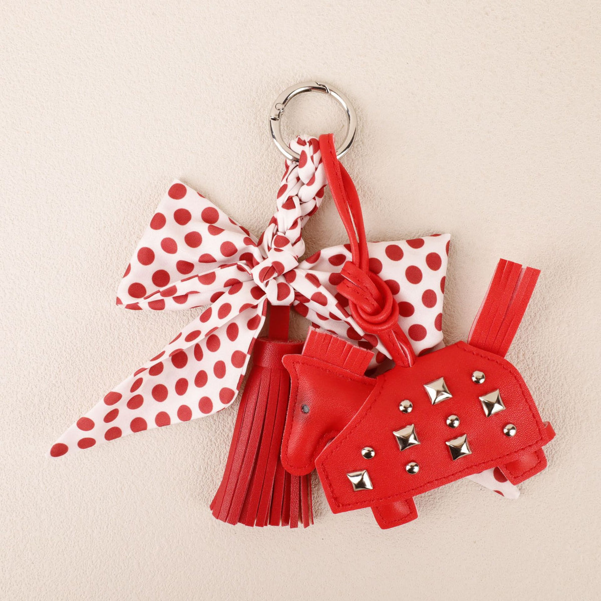 Red polka dot charm with scarf fabric for a backpack